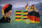Preview: Deutschland Fan-Set mit Afro-Perücke, Fan-Cape und Armband in Schwarz-Rot-Gold