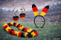 Preview: Deutschland Fan-Set mit Haarreif, Blumenkette und Armband in Schwarz-Rot-Gold